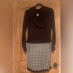 Black sweater dress. Never worn. Super cute with tall boots!